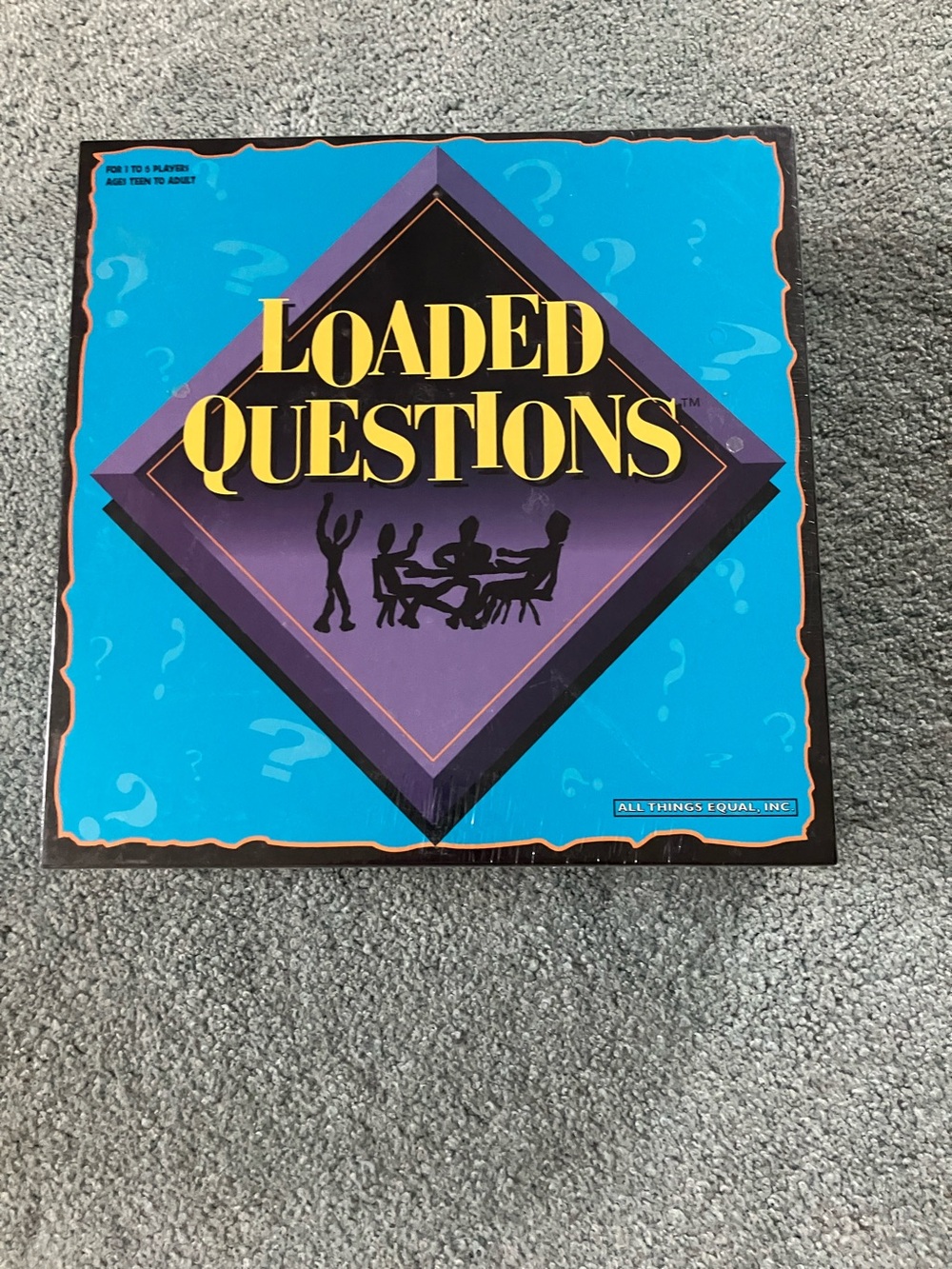 Loaded Questions Party Game by All Things Equal — Turquoise & Purple